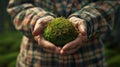 Person Holding a Moss Sphere. AI generated Royalty Free Stock Photo