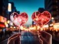 Person holding a present for Saint Valentine& x27;s day in his hands. Beautiful colorful background to st. Valentine