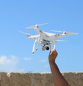 Person holding quadcopter Royalty Free Stock Photo