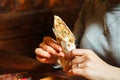 Person Holding a Slice of Pizza in Their Hand Royalty Free Stock Photo