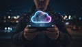 Person holding smartphone at night displaying glowing digital cloud icon with network connections representing global data storage Royalty Free Stock Photo