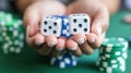A person holding two dice in their hands on a table with poker chips, AI Royalty Free Stock Photo