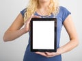 Person holding vertical blank screen tablet