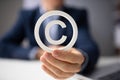 Person Holding White Copyright Sign Royalty Free Stock Photo