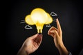 Person holding a yellow light bulb with cloud sketches AI generated Royalty Free Stock Photo