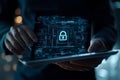Futuristic Digital Security Interface on Tablet Showing Padlock Icon and Binary Code Data Streams Royalty Free Stock Photo