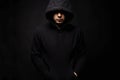 Person in Hood. Man or Boy in a hooded sweatshirt Royalty Free Stock Photo