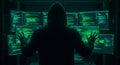 A person in a hoodie stands in front of multiple computer monitors displaying code generated Royalty Free Stock Photo