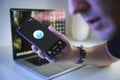 Person interacting with AI by voice with ChatGPT advanced voice mode developed by OpenAI