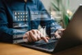 Person interacting with augmented reality interface on laptop for data analysis Royalty Free Stock Photo
