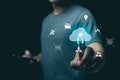 Person Interacting with Cloud Technology Icons and Data Transfer Symbols in a Conceptual Digital Environment for Modern Workflow Royalty Free Stock Photo