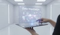 Person interacting with data visualization on futuristic tablet Royalty Free Stock Photo