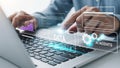 Person interacting with futuristic AI data interface on laptop Royalty Free Stock Photo