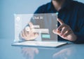 Person interacting with transparent A I chat interface on tablet technology artificial intelligence Royalty Free Stock Photo
