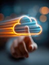Person interacting with a vibrant digital cloud icon symbolizing fast data transfer and modern cloud computing technology in a Royalty Free Stock Photo