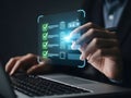 Person Interacting with Virtual Checklist on Laptop Screen Royalty Free Stock Photo