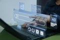 A person interacts with a digital interface displaying online advertisements, search bars, and data analytics, symbolizing modern Royalty Free Stock Photo