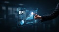 A person interacts with a high-tech digital interface displaying KPI data. The