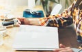 Person isolation reads book during breakfast and coffee on house quarantine, female hands close up flipping through magazine pages Royalty Free Stock Photo