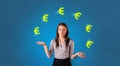 Person juggle with euro symbol Royalty Free Stock Photo