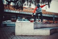 Person jumping with skateboard in school