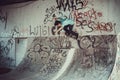 Person jumping with skateboard street