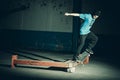 Person jumping with skateboard, trick in the street and urban style