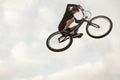 Person jumping on trial bike Royalty Free Stock Photo