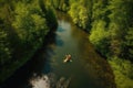 a person in a kayak down a river