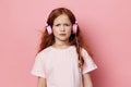 Person little sound children childhood cute listen headphones girl caucasian music kid portrait Royalty Free Stock Photo