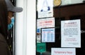 Person Looking at Closed Restaurant Sign Covid19 Coronavirus Pandemic Lockdown