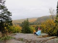 person looking at colorful autumn trees from top of Oberg Mountain Minnesota Royalty Free Stock Photo