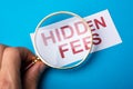 Person Looking At Hidden Fees Royalty Free Stock Photo