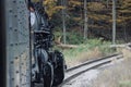 Person looking out of the Western Maryland Scenic Railroad train wagon