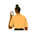 Person looking at smartphone screen. Black woman from behind, holding mobile cell phone in hand, reading. Girl with Royalty Free Stock Photo