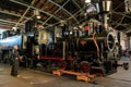 Person looking at the steam train engine