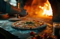 a person is making a pizza using an outdoor oven