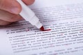 Person Marking Error With Red Marker Royalty Free Stock Photo