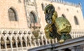 Person in mask at The Carnival of Venice 2018. Doge`s palace at background Royalty Free Stock Photo