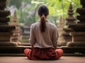 person meditating in the temple