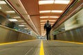 Person on moving travelator Royalty Free Stock Photo