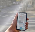 Person with navigation app on city street