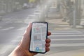 person with navigation app on city street