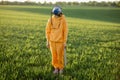 Person in gas mask on green field Royalty Free Stock Photo