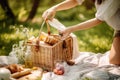 person, packing eco-friendly picnic basket for day in the park