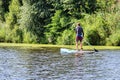 person in paddle boat river