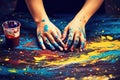 A person with paint-covered hands gently rests them on a table, leaving colorful handprints behind, Mother and child creating a