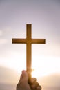 person palm hands to hold holy cross, crucifix to worship. Royalty Free Stock Photo