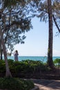 A person on the phone during holidays on the beach