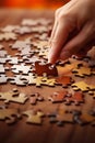 Person placing piece of puzzle together on table. Generative AI Royalty Free Stock Photo